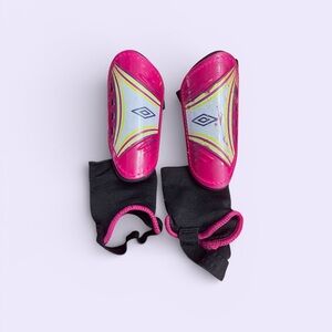 Pink and Black Umbro Shin Guards